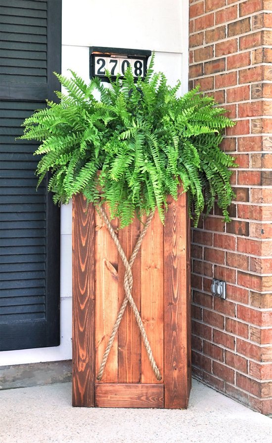 Tall Planters can increase the curb appeal of your home, but they're expensive. How about making them yourself? Begin with these DIY Tall Planter Ideas!
