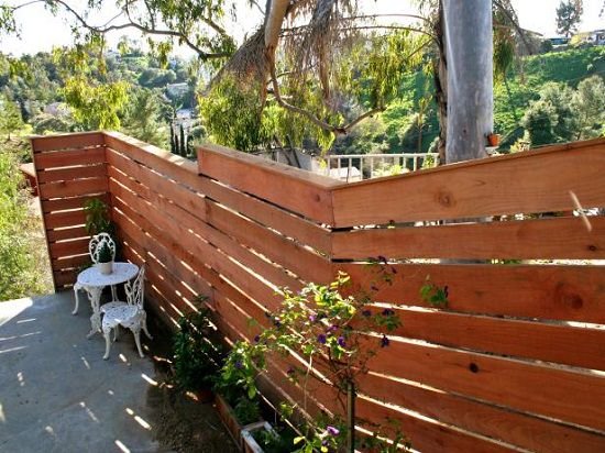 Plank Fence for a Sloping Backyard