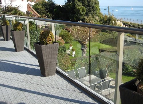 Glass Railing Balcony With Large Planters