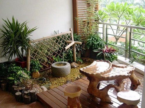 Mini Apartment Balcony With a Bamboo Fountain