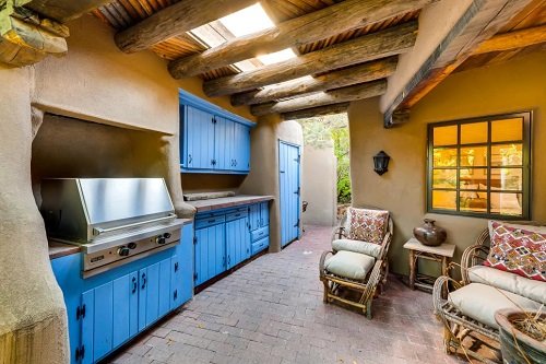 Outdoor Kitchen With Blue Cabinets