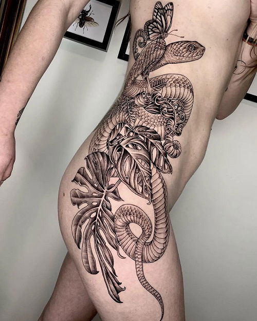 Monstera Leaves with a Snake and Butterfly tattoo