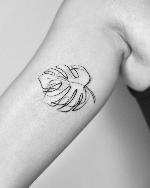 Premium AI Image  Monstera leaf hand drawn ink in stippling technique  Black and white isolated art floral tattoo