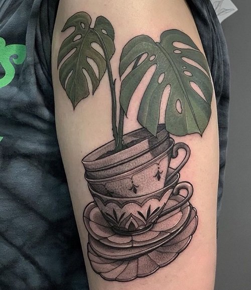 One-line tattoo of a lily and monstera leaf on Craiyon