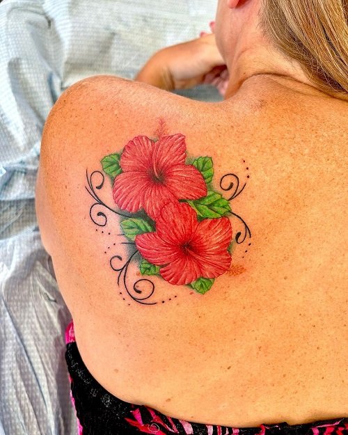 Girls rib hibiscus & vines flower tattoo