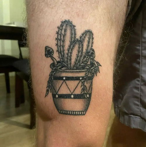 Cactus, Mushrooms, and Vines in a Barrel tattoo