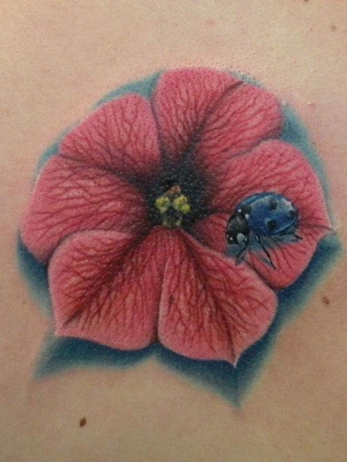Pink Petunia and Blue Ladybug Tattoo