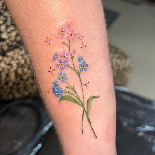 Tiny Flowers and Stars tattoo