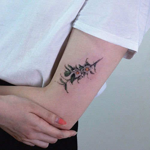 Flowers in White and Yellow tattoo