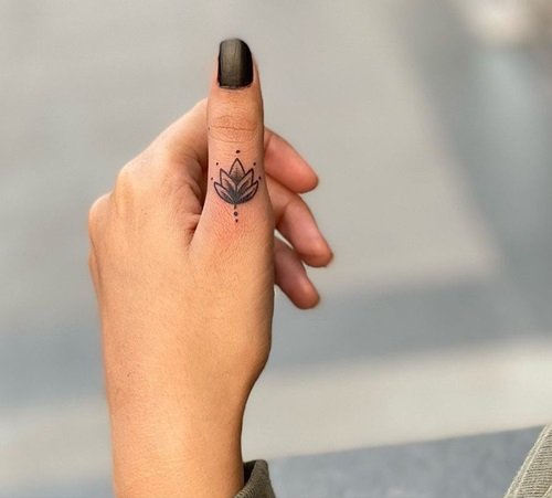 Lotus Thumb Tattoo Idea