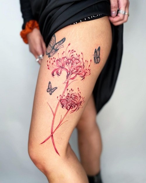 Feminine Spider Lily Thigh Design with Butterflies Tattoo 