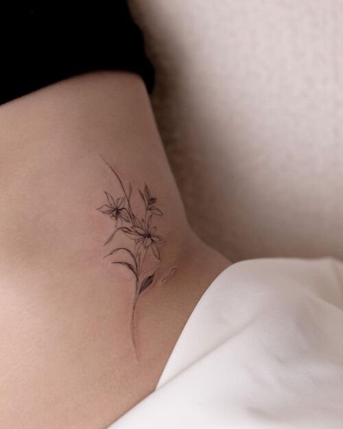 Narcissus Flower Belly Tattoo