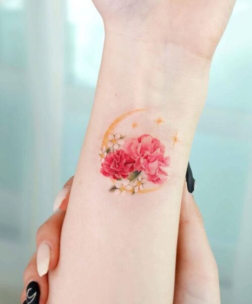 Carnation with Crescent Moon January birth tattoo