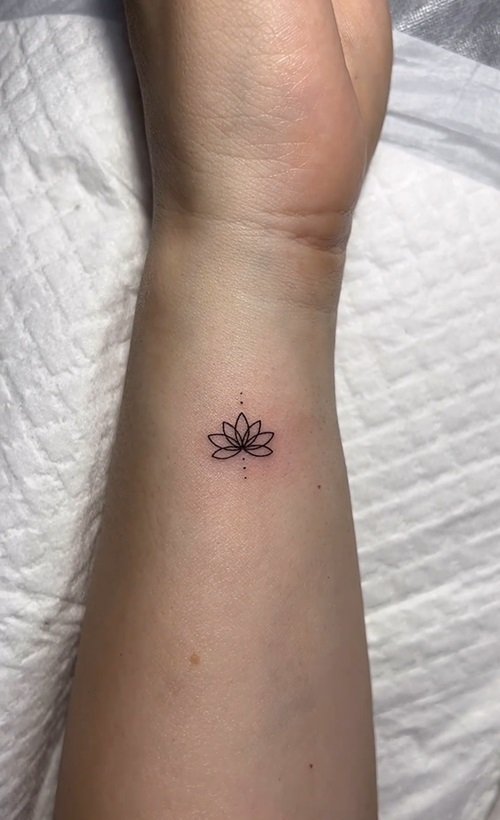 Mini Lotus Ornament on Wrist tattoo