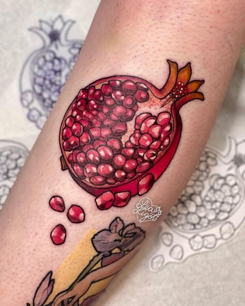 Pretty Pomegranate Ink tattoo