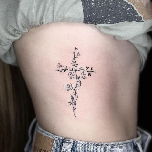 Side Body Flowered Cross tattoo ideas 