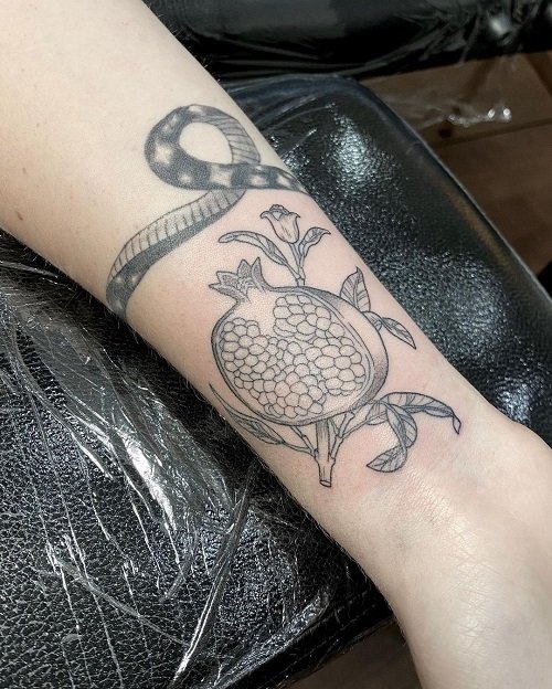 Black and White Pomegranate tattoo