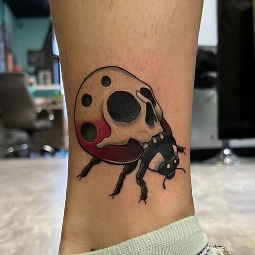 Ladybug with Skull on Body tattoo
