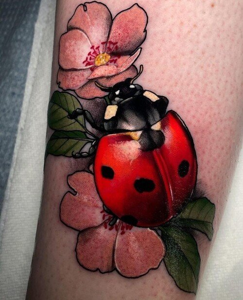 Realistic Ladybug and Flowers tattoo ideas