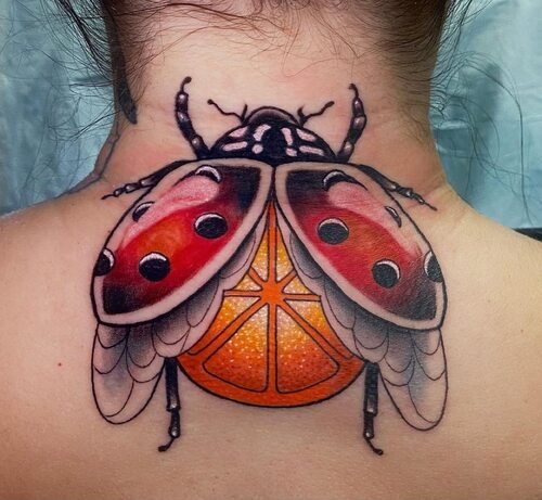 Ladybug on the Back tattoo