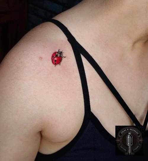 Small Ladybug on Shoulder tattoo
