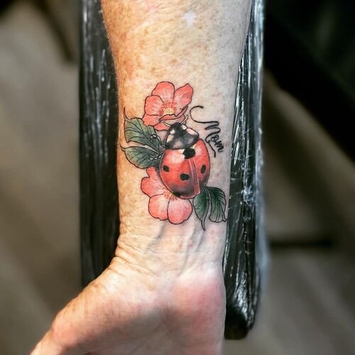Ladybug with Flowers for Mom tattoo ideas