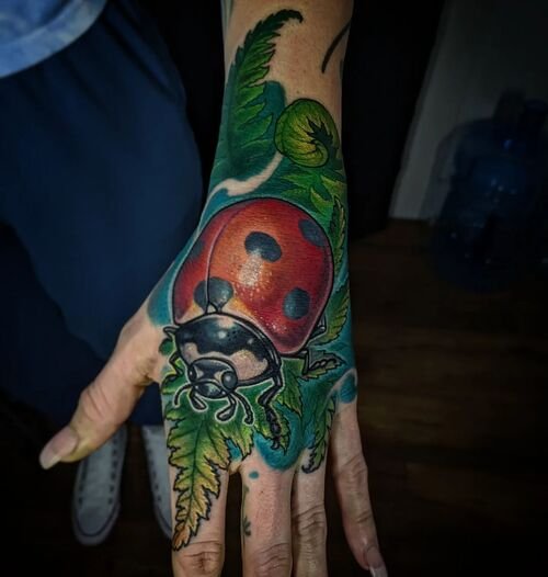 Ladybug and Leaves on Hand tattoo ideas