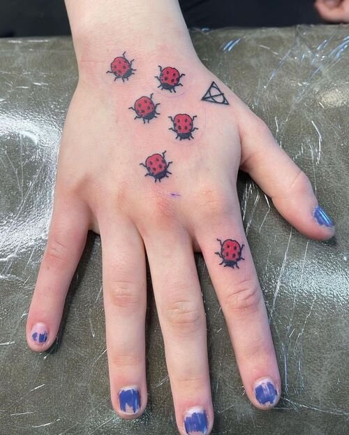 Tiny Ladybugs tattoo ideas