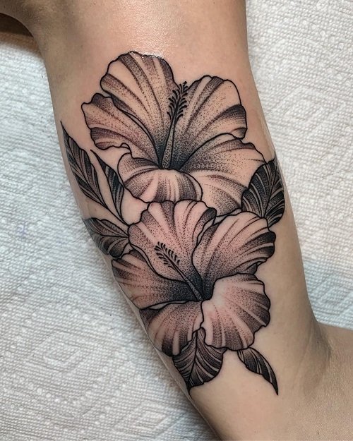 Hibiscus on Inner Bicep tattoo