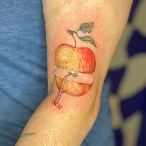 Happy Apple with Rainbow and Tiny Man apple tattoo ideas