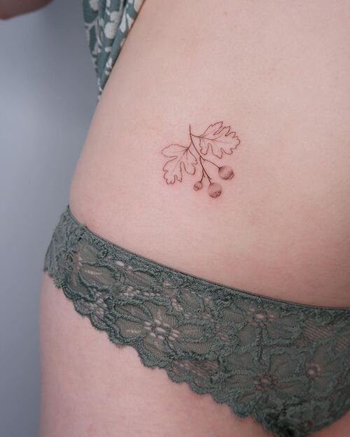 Delicate Hawthorne May Birth Flower Tattoo Ideas