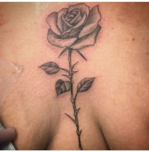 Tattoo uploaded by Shameless Tattoo • Rose jewel sternum tattoo. • Tattoodo