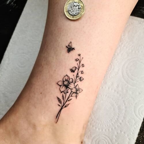 Lily of the Valley with a Bee May Birth Flower Tattoo Ideas