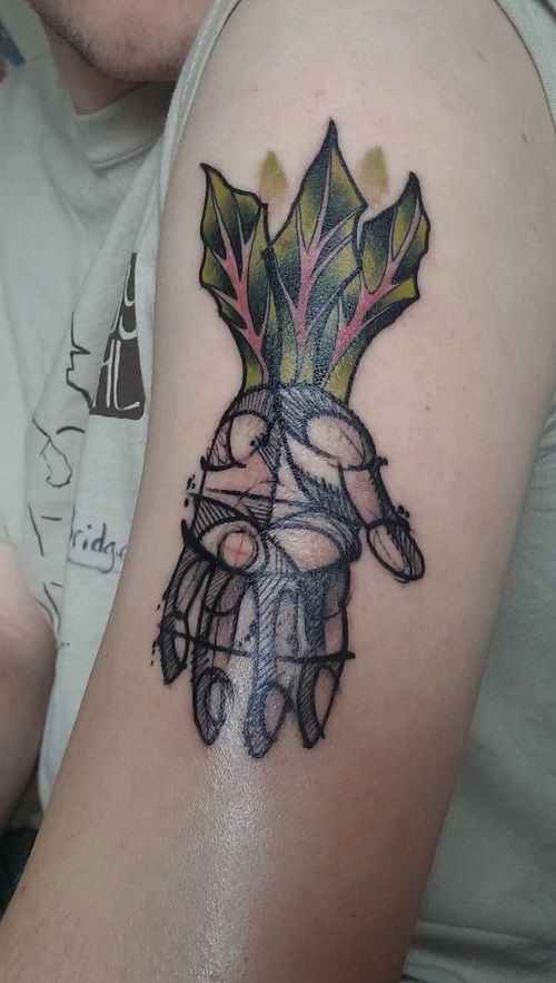 Hand with Beet Leaves