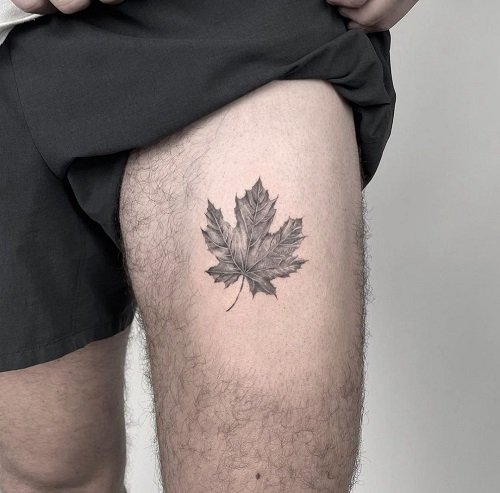 a man with hemp leaf tattoo Stock Photo - Alamy