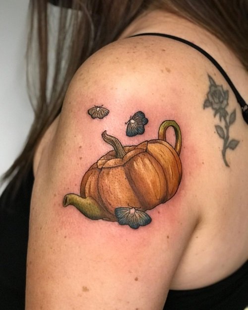 10+ Simple and Chic Pumpkin Tattoo Designs! | Pumpkin tattoo, Lantern tattoo,  Cute halloween tattoos