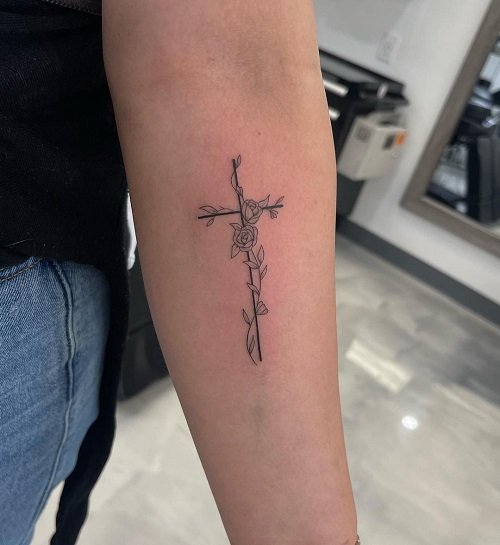 feminine cross with flowers tattoo 2