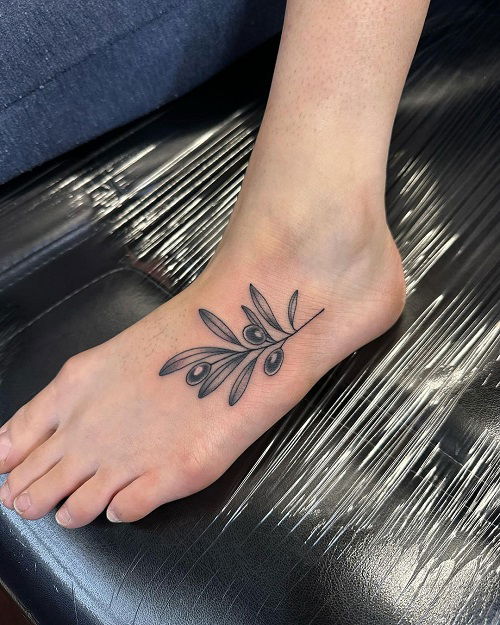 black olive branch tattoo